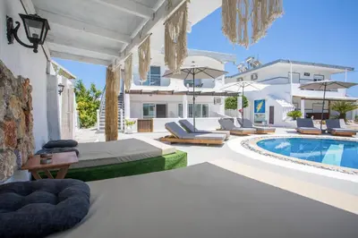 a villa with a swimming pool and a resort at Toulas Studios & Apts No2 in Faliraki