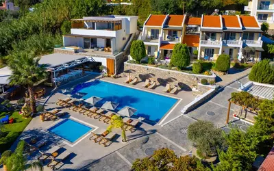 an aerial view of a villa with a swimming pool at Johannes Boutique Apartments & Suites in Afantou