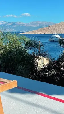 a view of a boat in the water at Villetta Erato-picturesque studio in Halki