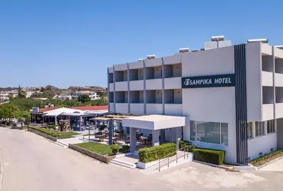 an empty street in front of a hotel at Tsampika Hotel Faliraki in Faliraki
