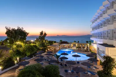 an aerial view of a hotel with a pool and umbrellas at Lito Hotel in Ixia