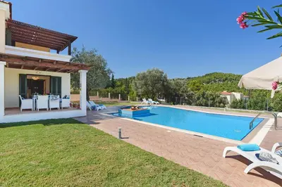 an image of a villa with a swimming pool at Seven Springs Villas Artemis Villa in Kolimbia