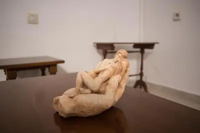a statue sitting on a table in a room at Emerald Dream House in Rhodes Town