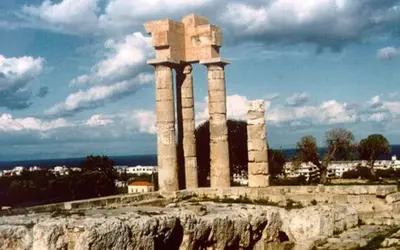 a building with columns on top of a hill at Apollon Apartments H-2 in Rhodes Town