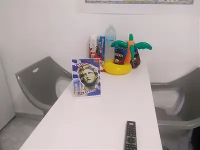 a white counter top with a toy duck on a toilet at Apollon Apartments H-1 in Rhodes Town