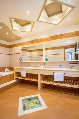 a bathroom with a sink and a bath tub at MeFoMi Villa in Rhodes Town