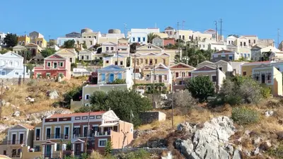 a group of houses on top of a hill at Villa Ricolas in Symi