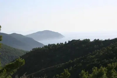 a view of the ocean from a mountain at Ataviros Hotel in Émbonas