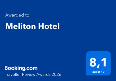 a blue sign with the text mailed to melion hotel at Meliton Hotel in Theologos