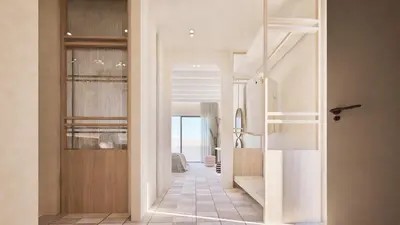 a hallway with a staircase leading into a house at Pefkos Blue in Pefki Rhodes