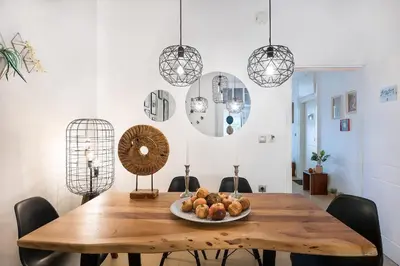 a dining room table with a plate of fruit on it at Monte Smith Hill in Rhodes Town
