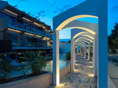 a view of a building with an archway at Kolymbia Bay Art Boutique Hotel - Adults Only in Kolimbia