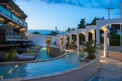 a swimming pool in the middle of a building at Kolymbia Bay Art Boutique Hotel - Adults Only in Kolimbia