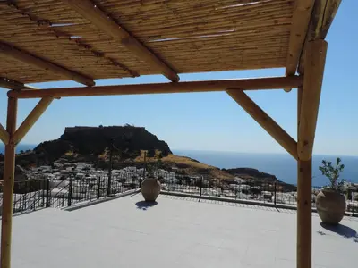 a view from the roof of a house with a view of the ocean at Villa Anna Maria Lindos in Líndos