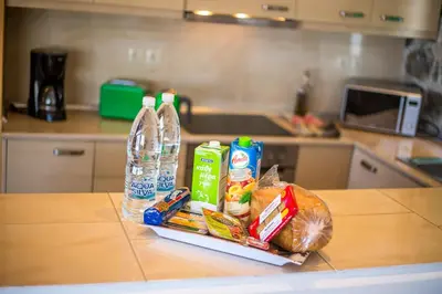 a kitchen counter with a bunch of food on it at Villa Helios in Kalathos