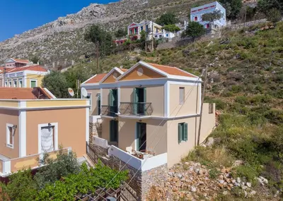 a house on the side of a hill at Astradeni House by Blue Wave in Symi
