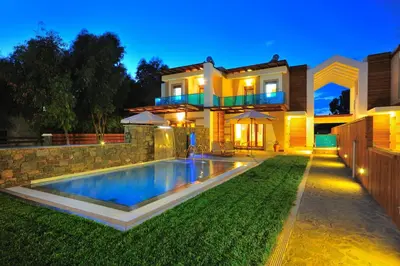 a house with a swimming pool in the yard at Horizon Line Villas in Kiotari