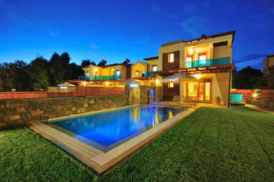 a house with a swimming pool in the yard at Horizon Line Villas in Kiotari