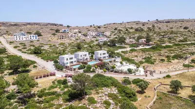 an aerial view of a village on a hill at Spilia Bay Villas in Pefki Rhodes