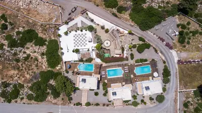 an aerial view of a house with a pool at Spilia Bay Villas in Pefki Rhodes