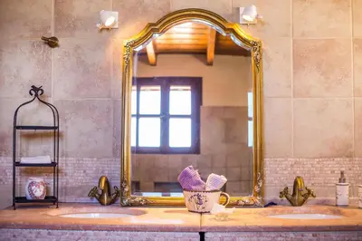 a bathroom with two sinks and a large mirror at Sunny Countryside Villa - With private pool in Faliraki