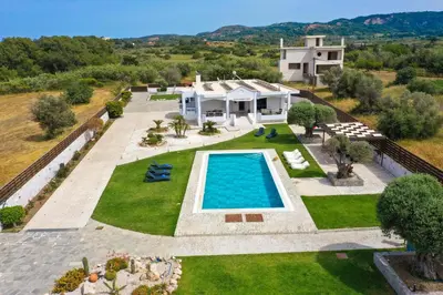 an aerial view of a villa with a swimming pool at Marble Pool Villa in Pastida