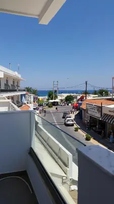 a view of a city street from a balcony at Ria's Deluxe Apartments in Faliraki