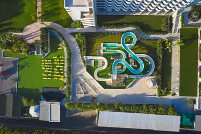 an aerial view of a resort with a sign at Esperides Beach Resort in Faliraki