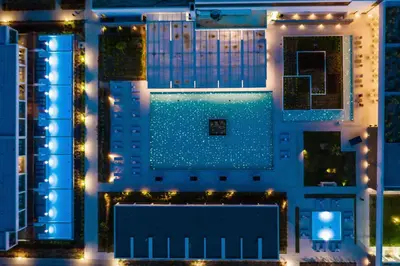 an overhead view of a building with a pool at night at Gennadi Grand Resort - Premium All Inclusive in Gennadi