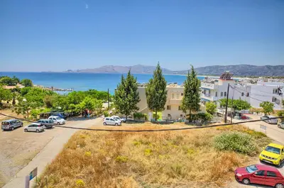 arial view of a city with cars parked in a parking lot at Haraki View in Haraki