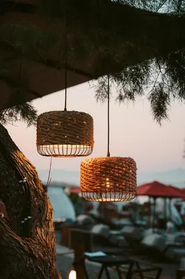 a group of three lights hanging from a tree at Grande Albergo Delle Rose in Rhodes Town