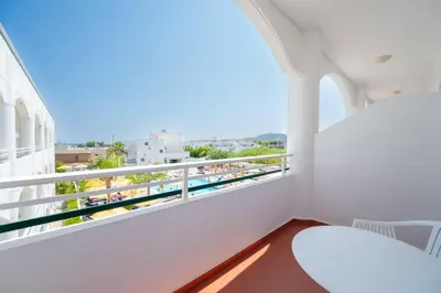 a balcony with a view of the beach at Orion Hotel in Faliraki