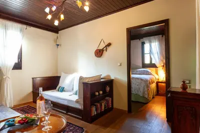 a bedroom with a bed and a mirror at Spirit Of The Knights Boutique Hotel in Rhodes Town