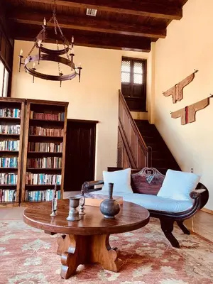 a living room with a couch and a table at Spirit Of The Knights Boutique Hotel in Rhodes Town
