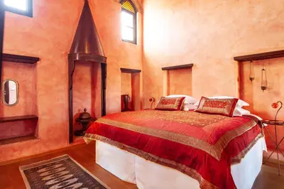 a bedroom with a large bed in a room at Spirit Of The Knights Boutique Hotel in Rhodes Town
