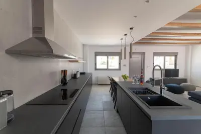a kitchen with a sink and a counter top at Aegean Treasure Pefkos in Pefki Rhodes