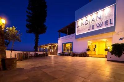 a building with a sign that reads indian jewel at Lindian Jewel Hotel and Villas in Líndos