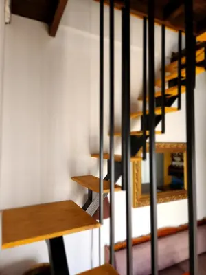 a group of wooden shelves in a room at Lindos Boutique - Adults Only in Líndos