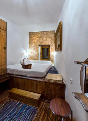 a bedroom with a bed in a room at Lindos Boutique - Adults Only in Líndos
