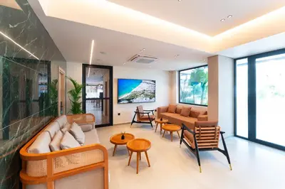 a living room with a couch and chairs at Hippocampus Boutique Hotel in Ixia