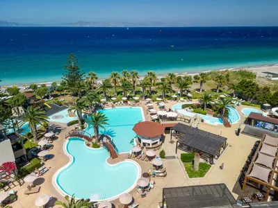 an aerial view of a resort with a swimming pool at D'Andrea Mare Hotel in Ialyssos