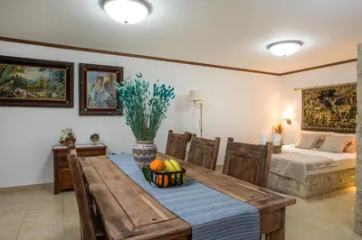 a room with a table with a bowl of fruit on it at Anna's House Traditional in Halki