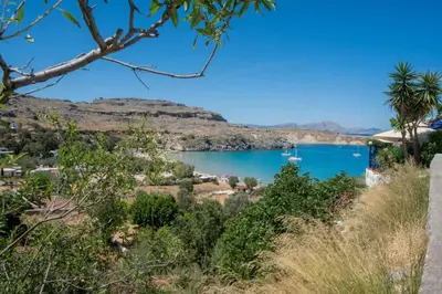 a view of a lake from a hill at Lindos Marianthi Studios in Líndos