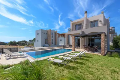 an image of a villa with a swimming pool at Blue Wave Villa in Gennadi