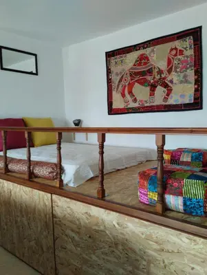 a room with a wooden shelf with a rug on it at Mata's Sea House in Lachania
