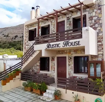 a building with a sign for a music house at Rustic House in Émbonas