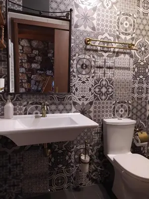 a bathroom with a sink and a toilet at Rustic House in Émbonas