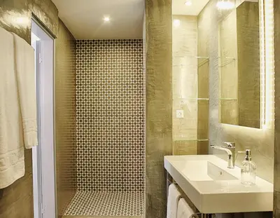 a bathroom with a sink and a shower at Kalithea Hills Appartment 1 in Koskinou
