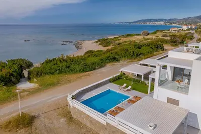 an aerial view of a house with a swimming pool at Villa Sea La Vie in Kiotari