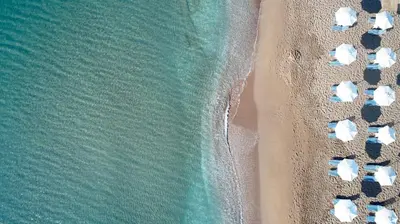 an overhead view of a beach with a group of people at Apollo Blue in Faliraki